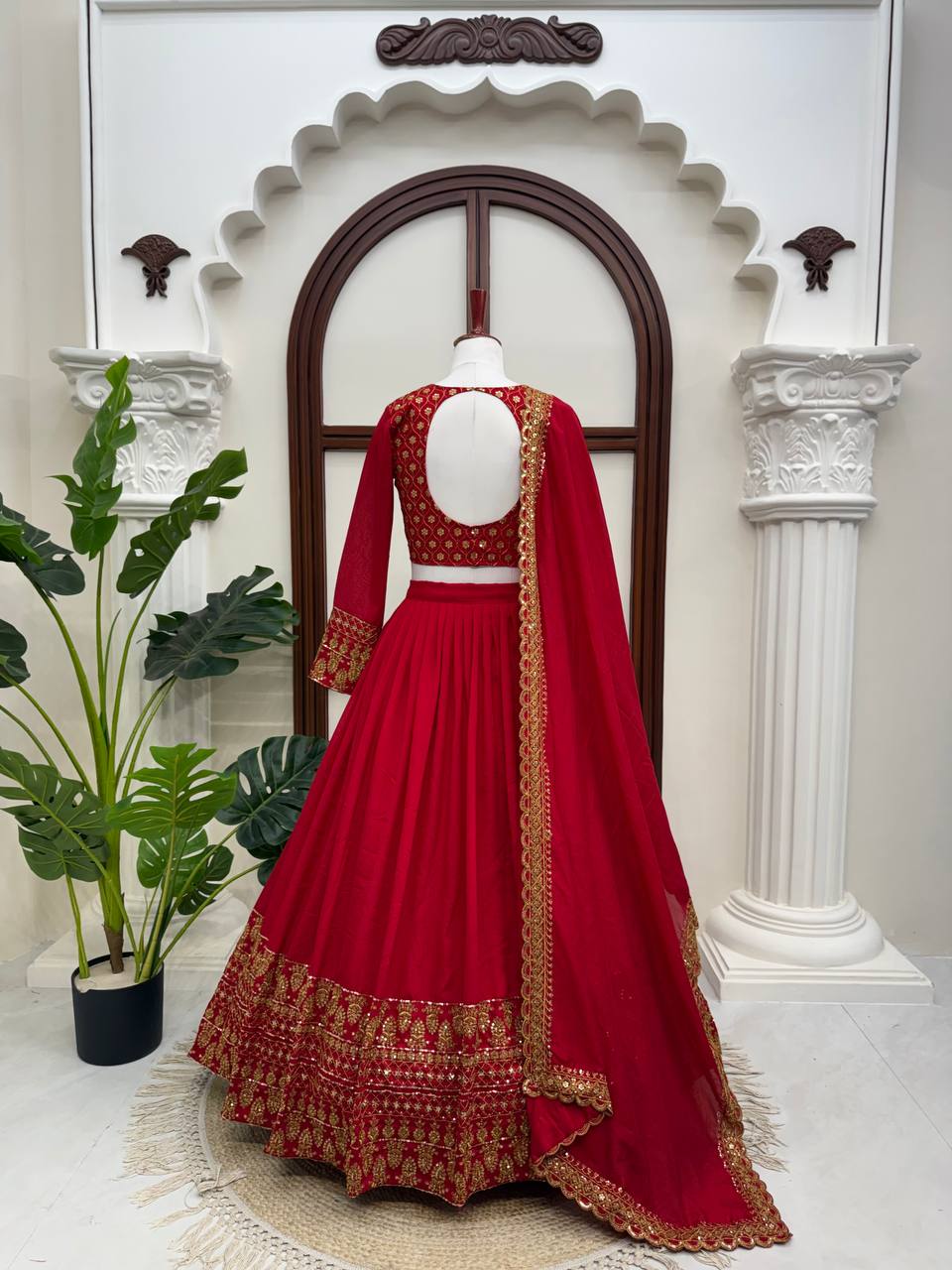 Classic Crimson Red Bridal Lehenga Choli Featuring Opulent Gold Zari Embroidery and Scalloped Borders